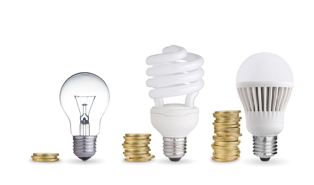 lightbulbs and coins in a row | Featured Image For 4 Great Ways to Save for an Investment Property in the New Year blog